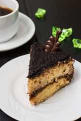 Truffle cake with coffee for breakfast. wood background. Top view. Close-up