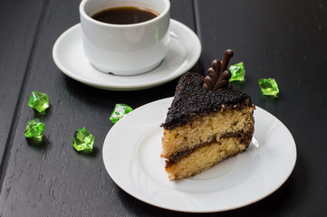 Truffle cake with coffee for breakfast. wood background. Top view. Close-up