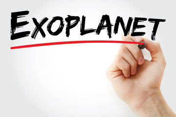 Hand writing Exoplanet with marker, concept background