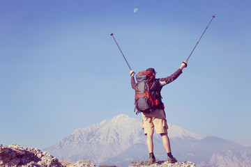 Hiking in the mountains in the summer on a sunny day.