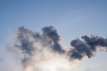 The texture of the smoke on blue sky background
