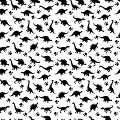 Cute kids pattern for girls and boys. Colorful dinosaurs on the abstract grunge background create a fun cartoon drawing. The background is executed in monochrome colors. For textile and fabric