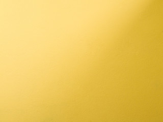 Obraz premium texture The walls are made of concrete, a yellow-orange. A gradient light .