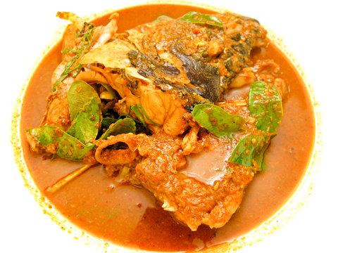 Cooking for chili fish head curry