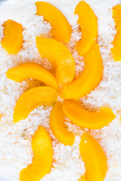 Peach with grated coconut
