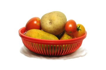 vegetables in a red basket
