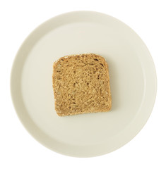 Diätkonzept - Abnehmen durch Verzicht - Einzelne Brotscheibe auf Teller