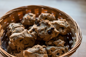 Chocolate Chip Cookies in wicker bowl.