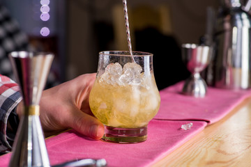 bartender making cocktail