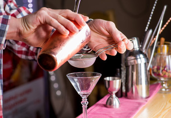bartender making cocktail