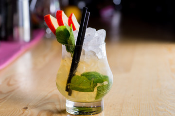 drink in a beautiful glass on the bar