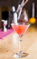drink in a beautiful glass on the bar