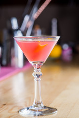 drink in a beautiful glass on the bar