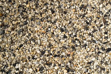 Motley background with sea pebbles