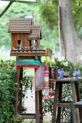 Thai style wooden spirit house or joss house.