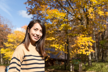 Young asian woman in Autumn season