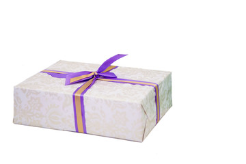 Box gift tied with ribbon. Gift isolated on a white background. Beautiful  surprise gift. Festive joy.