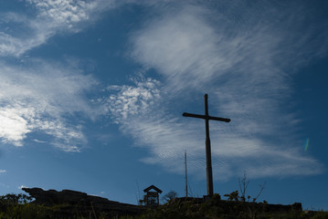 Cross under blue sky in Brazil