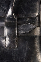 seams on leather hand bag