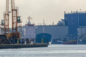 KOLOBRZEG - MERCHANT VESSEL AT PORT © Wojciech Wrzesień
