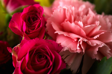 Many summer flowers in the bouquet. Roses, chrysanthemums, dahli