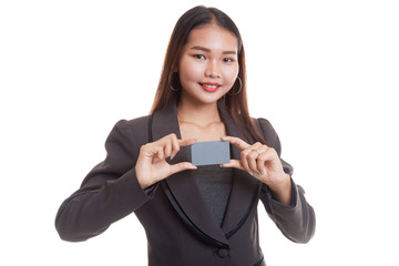 Naklejka premium Young Asian business woman smile with blank card.