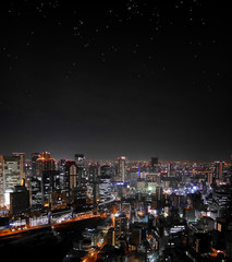 Fototapeta na wymiar Osaka night skyline with stars