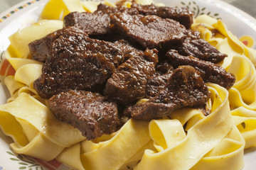 Carbonnade de Boeuf - Belgian beef braised in beer over noodles