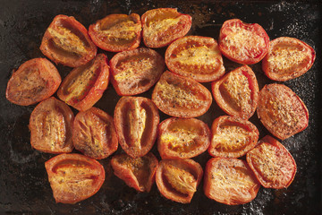 tomato halves roasting in the oven