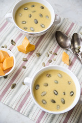pumpkin soup with pumpkin seeds for a dinner for two