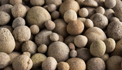Fototapeta na wymiar Sea stones on the beach, background. Sea pebbles.