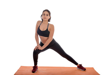 Obraz premium Sport girl doing yoga isolated on white background