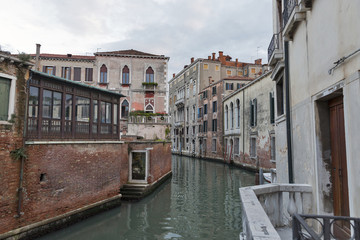 Fototapeta na wymiar Venice cityscape, narrow water canal and traditional buildings.