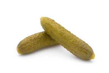 Marinated pickled cucumbers isolated on the white.