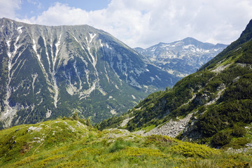 Fototapeta na wymiar Green hills and Landscape to Banderishki chukar peak, Pirin Mountain, Bulgaria
