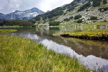 Fototapeta na wymiar Muratovo lake and Banderishki chukar peak, Pirin Mountain, Bulgaria