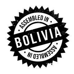Assembled in Bolivia rubber stamp. Grunge design with dust scratches. Effects can be easily removed for a clean, crisp look. Color is easily changed.