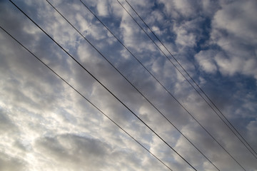 electrical wires on the dawn of the sun
