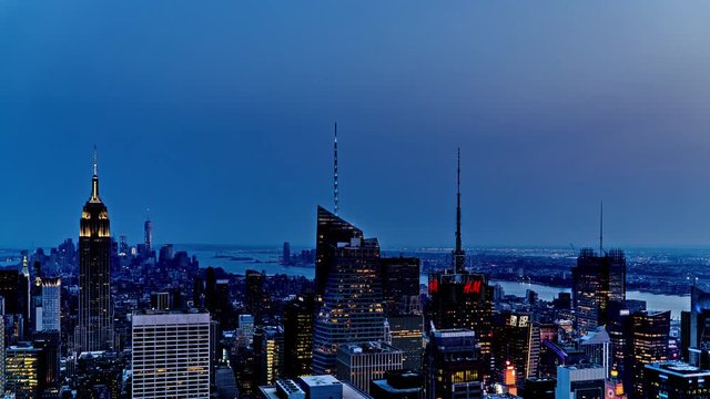 Timelapse of the cityscape looking from Rockefeller Center at dusk, NYC, USA
