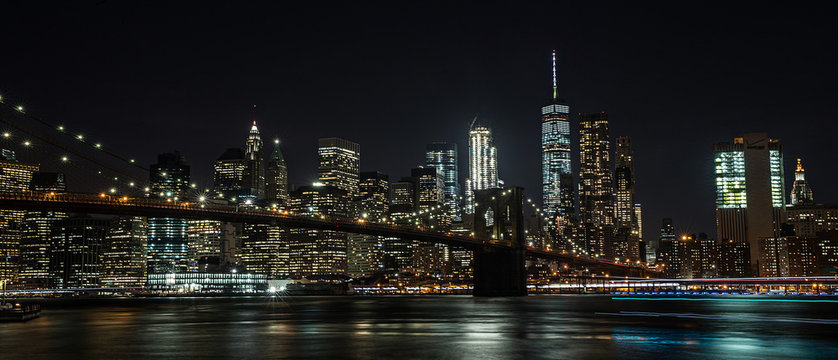 Fototapeta Brooklyn Bridge and New York City at night