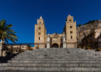 Fototapeta na wymiar Cefalu's Cathedral, one of the most interesting buildings in Sicily, originated by the Norman King Roger II, consecrated in 1267. Reflects Norman, Latin, Greek, and Arab architectural influences.