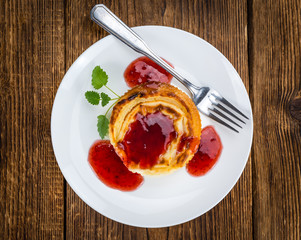 Fresh made Cheesecake with berry Sacue