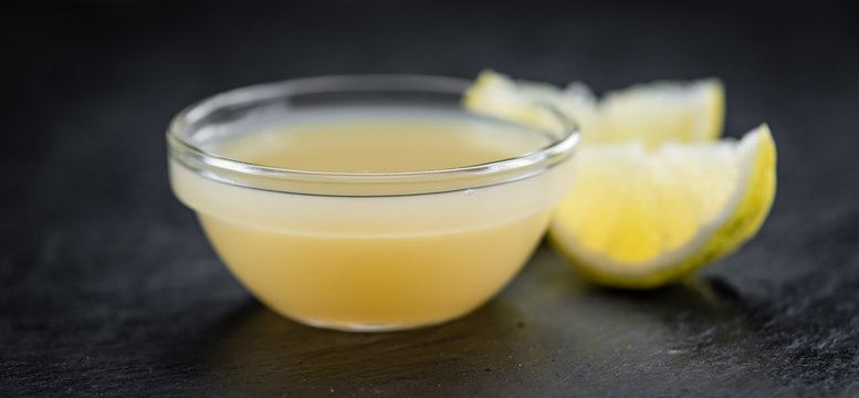 Lemon Juice on a slate slab (selective focus)