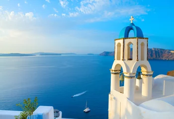 Fotobehang Church in Oia with traditional belfry, Santorini, Greece © tilialucida