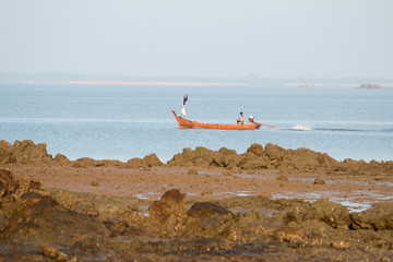 Fishermen on a boat ride out to put the Nets.