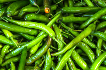 very hot and spicy chilli peppers on an asian market.