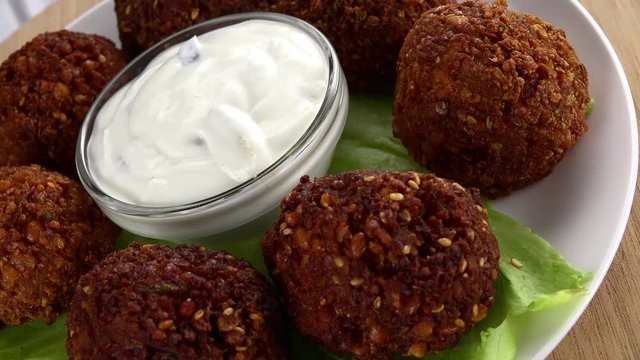 Some homemade Fried Falafel (not loopable; roating) as 4K UHD footage