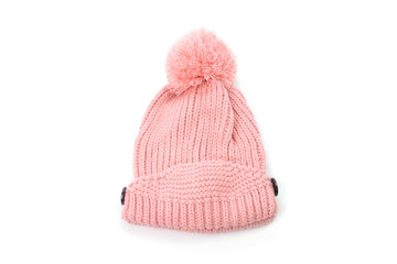 pink knitted hat with pompom isolated on white background