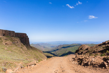 Mountain Pass Valley steep rugged road up and down scenic landscape