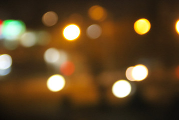 Abstract background of blurred city lights with bokeh effect